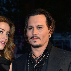 Johnny Depp et sa femme Amber Heard à l'Avant-première du film "Black Mass" lors du Festival BFI à Londres, le 11 octobre 2015.