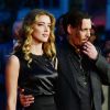 Johnny Depp et sa femme Amber Heard à l'Avant-première du film "Black Mass" lors du Festival BFI à Londres, le 11 octobre 2015.
