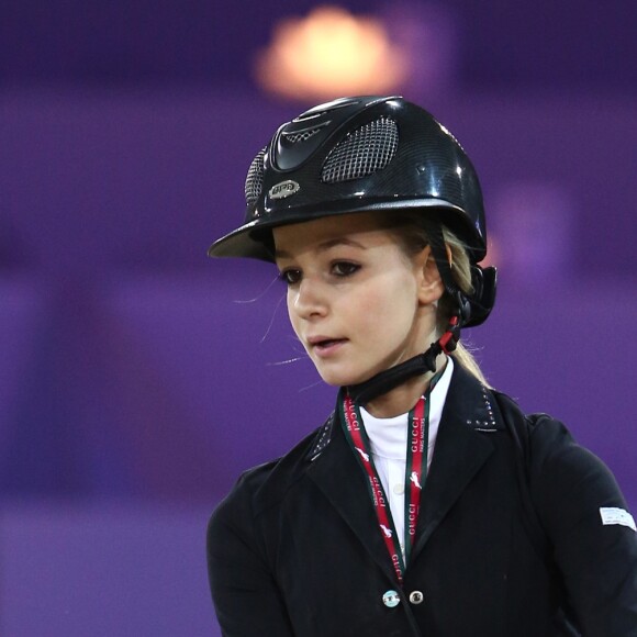 Exclusif - Arnaud Lagardère, sa femme Jade Foret et leurs filles Liva et Mila et Maïte, la mère de Jade viennent applaudir Cassandra, soeur de Jade, aux Gucci Paris Masters le 4 décembre 2014 au parc des expositions Paris-Nord Villepinte.