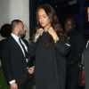 Rihanna quitte le Tramp à Londres, habillée d'un pull Vetements et chaussée de sandales Christian Louboutin (modèle Devibroda). Le 30 juin 2016.