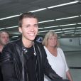 Debbie Rowe et son fiancé Marc Schaffel, en compagnie du jeune chanteur belge Ian Thomas dont ils sont les managers, arrivent à l'aéroport de Sao Paulo au Brésil, le 26 août 2014.
