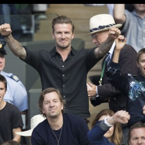 David Beckham et ses enfants Cruz et Romeo dans les tribunes du tournoi de Wimbledon le 6 juillet 2016. © Stephen Lock/i-Images via ZUMA Wire / Bestimage06/07/2016 - Londres