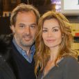Ingrid Chauvin et son mari Thierry Peythieu au salon du livre à la porte de Versailles à Paris le 22 mars 2015.