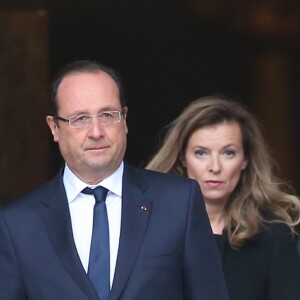 Francois Hollande et Valerie Trierweiler - Sortie des obsèques de Patrice Chéreau en l'eglise Saint-Sulpice a Paris. Le 16 octobre 2013.