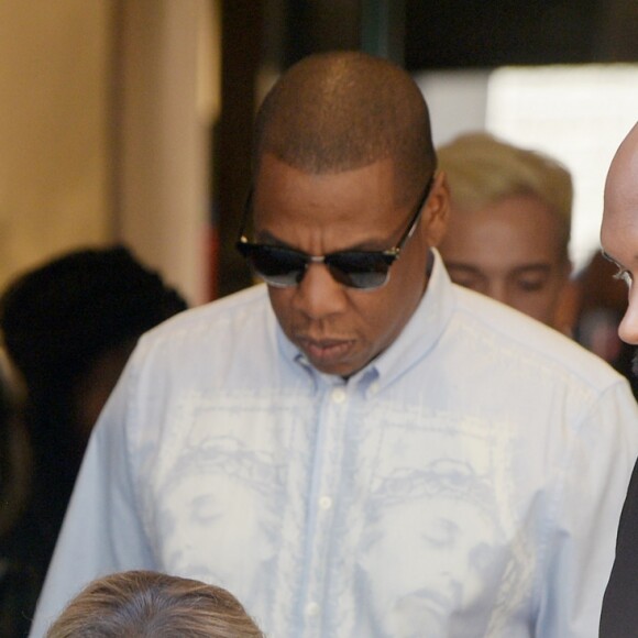 Beyoncé et Jay Z quittent le magasin Roberto Cavalli à Milan, le 18 juillet 2016.
