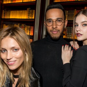 Anja Rubik, Lewis Hamilton et Barbara Palvin lors du Dîner Lewis Hamilton et Melvin Chua à La Réserve à Paris le 7 mars 2016. © Cyril Moreau / Bestimage