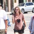 Ellen Pompeo quitte un restaurant avec son mari Chris Ivery le 13 juillet 2015.