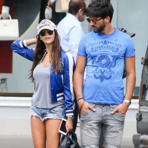 Exclusif - Nabilla Benattia et son compagnon Thomas Vergara déjeunent chez "Pizza Pino" sur les Champs Elysées et vont faire du shopping sur l'Avenue Montaigne avec leur chien Pita à Paris, France, le 21 juillet 2016. © Agence/Bestimage