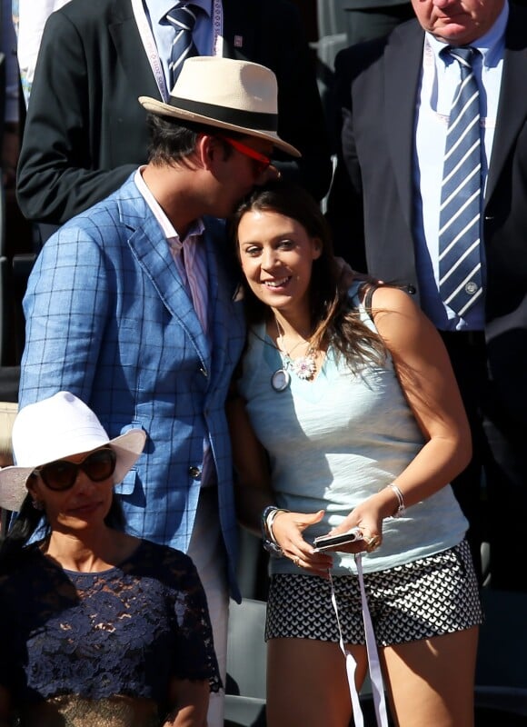 Marion Bartoli et son compagnon dans les tribunes lors de la finale des Internationaux de tennis de Roland-Garros à Paris, le 6 juin 2015.