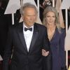 Clint Eastwood et sa compagne Christina Sandera - People à la 87e cérémonie des Oscars à Hollywood, le 22 février 2015.