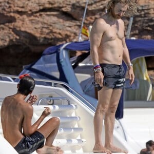 Exclusif - David Guetta et sa compagne Jessica Ledon en vacances à Ibiza, le 28 juillet 2016