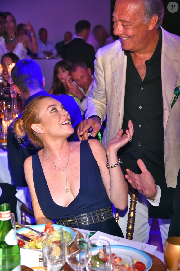 Lindsay Lohan et Fawaz Gruosi lors de la soirée d'anniversaire "Fawaz's Folies" pour les 64 ans de Fawaz Gruosi (de Grisogono) à la Cala di Volpe à Porto-Cervo, Sardaigne, Italie, le 8 août 2016.