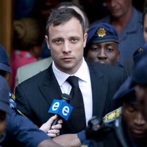 Oscar Pistorius quitte le tribunal de Pretoria, où il a été déclaré coupable d'homicide involontaire. Le 12 septembre 2014