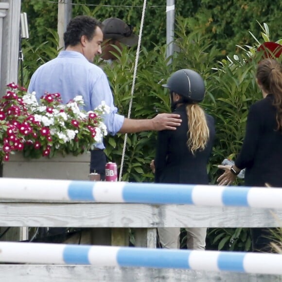 EXCLUSIF - Olivier Sarkozy encourage sa femme Mary-Kate Olsen lors du jumping "Hampton Classic Horse Show " à Bridgehampton près de New York le 1er septembre 2016.