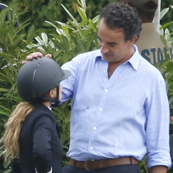 EXCLUSIF - Olivier Sarkozy encourage sa femme Mary-Kate Olsen lors du jumping "Hampton Classic Horse Show " à Bridgehampton près de New York le 1er septembre 2016.