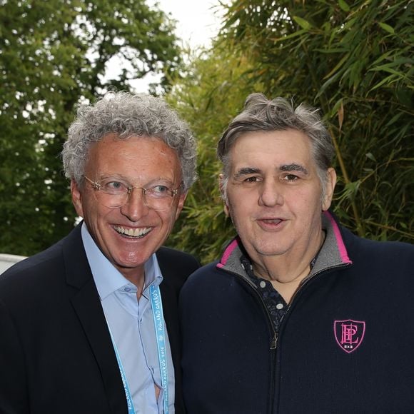 Nelson Monfort, Pierre Ménès - People au village lors du Tournoi de Roland-Garros (les Internationaux de France de tennis) à Paris, le 28 mai 2016. © Dominique Jacovides/Bestimage