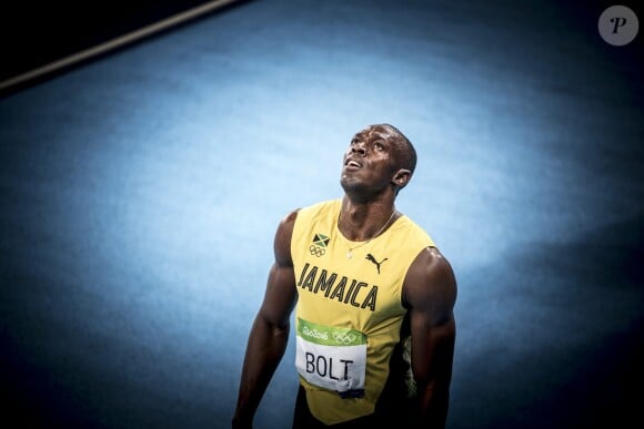 Usain Bolt participe à la finale du 200 mètres hommes au stade olympique à Rio, le 18 août 2016.