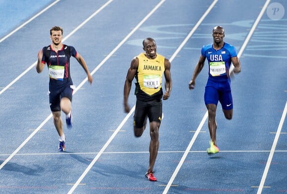 Christophe Lemaitre, Usain Bolt, LaShawn Merritt participent à la finale du 200 mètres hommes au stade olympique à Rio, le 18 août 2016.
