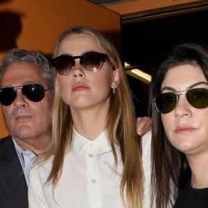 Amber Heard arrive au tribunal pour sa déposition contre Johnny Depp pour violences conjugales dans la procédure de divorce à Century City, le 13 août 2016.