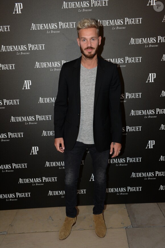 M. Pokora à l' inauguration de la boutique Audemars Piguet, 15 rue Royale, et présentation de la nouvelle collection Royal Oak Yellow Gold, à Paris, le 26 mai 2016. © Rachid Bellak