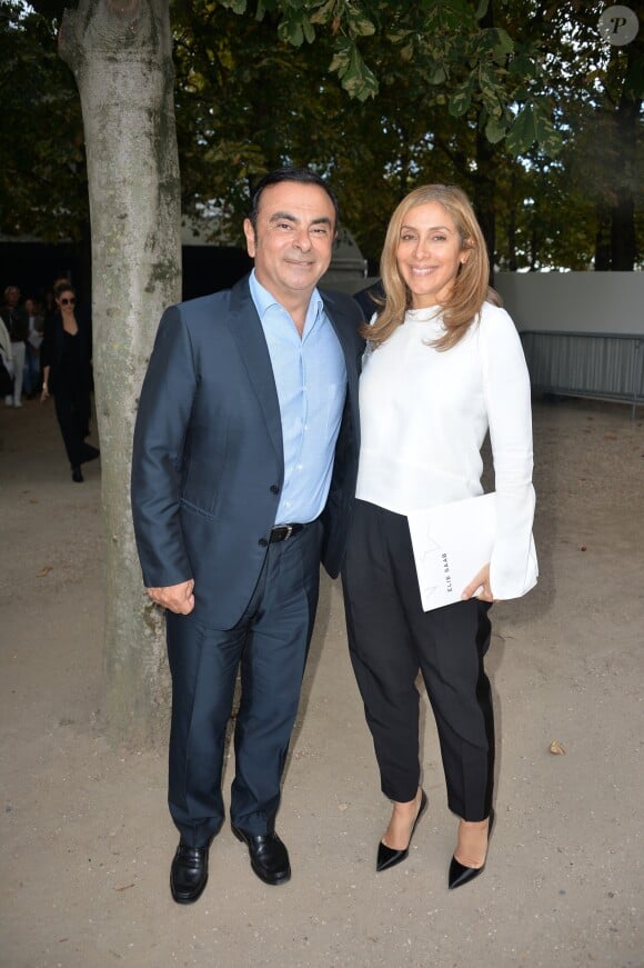 Carlos Ghosn et sa femme Carole arrivant au défilé de mode "Elie Saab", collection prêt-à-porter Printemps-Eté 2017 à Paris, le 1er octobre 2016