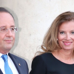 François Hollande et Valerie Trierweiler au dîner en l'honneur de Mr Joachim Gauck, président federal d'Allemagne au palais de l'Elysee à Paris le 3 septembre 2013.