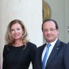 Francois Hollande et Valérie Trierweiler lors du dîner en l'honneur de Mr Joachim Gauck, président fédéral d'Allemagne au palais de l'Elysee a Paris le 3 septembre 2013.