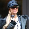 Paris Hilton se balade avec son nouveau petit chihuahua adopté pour la modique somme de 8000 dollars à New York! Le 11 octobre 2016