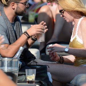 Lindsay Lohan et Dennis Papageorgiou sur une plage à Mykonos, le 28 août 2016