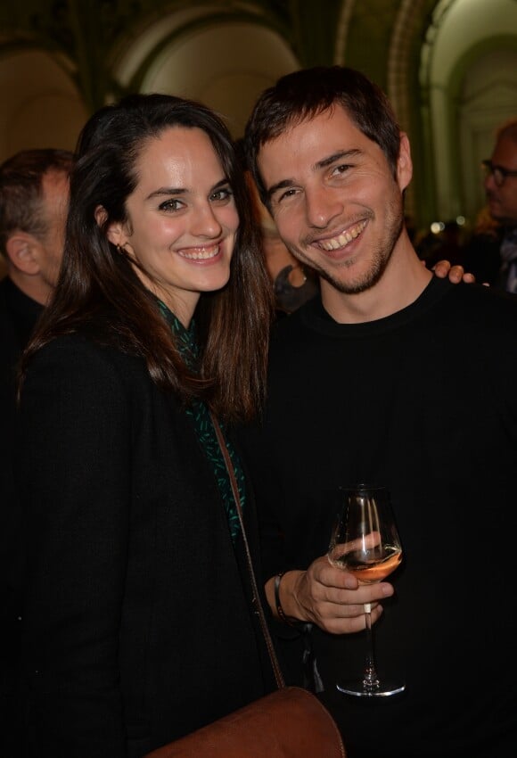 Noemie Merlant and her boyfriend Simon Bouisson attending 'Orange' Party at  the 43rd International Contemporary Art Fair FIAC opening night, at the  Grand Palais, in Paris, France on October 19, 2016. Photo