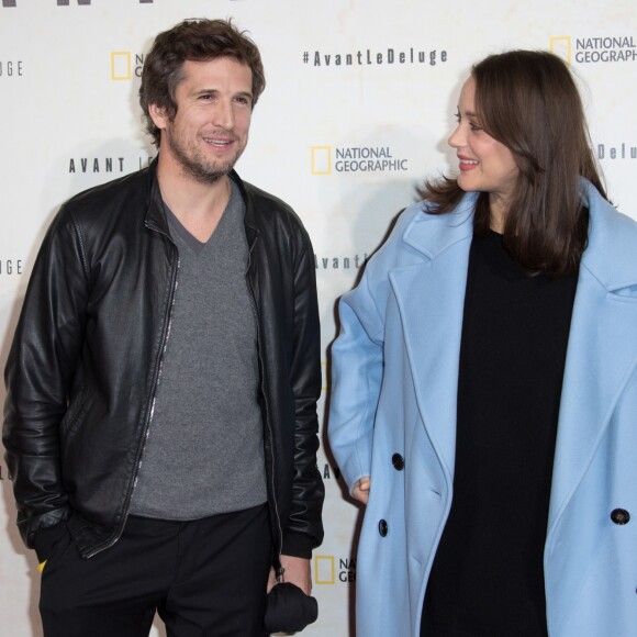 Marion Cotillard enceinte et son compagnon Guillaume Canet - Avant première du documentaire "Before the flood" au théâtre du Chatelet à Paris le 17 octobre 2016. © Cyril Moreau/Bestimage