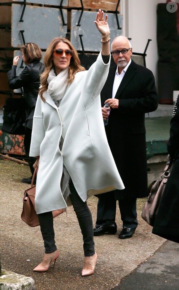 Céline Dion et son mari René Angélil quittent leur hôtel pour se rendre à l'enregistrement de l'émission "Vivement Dimanche". Paris, le 27 novembre 2012