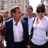 Nicolas Sarkozy avec sa femme Carla Bruni-Sarkozy, Maud Fontenoy, et le député maire de Nice, Christian Estrosi sont dans les rues de Nice après avoir déjeuné au restaurant "La Petite Maison" et avant de rencontrer les élus et les militants du parti Les Républicains au jardin Albert 1er le 19 juillet 2015.
