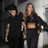 Zayn Malik et sa compagne Gigi Hadid quitte le défilé de mode "Versace Versus" à Londres. Le 17 septembre 2016