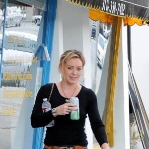 Hilary Duff se rend à une fête d'anniversaire avec son mari Mike Comrie, dont elle est séparée, et leur fils Luca à Sherman Oaks, le 19 juillet 2014.  Please hide children face prior publication - Hilary Duff, her ex-husband Mike Comrie, and their son Luca attend a party in Sherman Oaks, California on July 19, 201419/07/2014 - Sherman Oaks