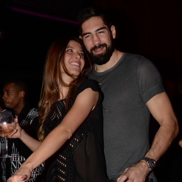 Nikola Karabatic et sa compagne Géraldine Pillet - Les champions du monde de handball fêtent leur victoire au VIP Room à Paris le 2 février 2015.
