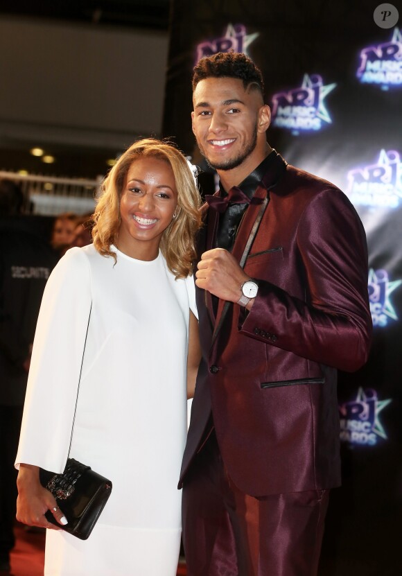 Estelle Mossely et son fiancé Tony Yoka à la 18ème cérémonie des "NRJ Music Awards" au Palais des Festivals à Cannes, le 12 novembre 2016.