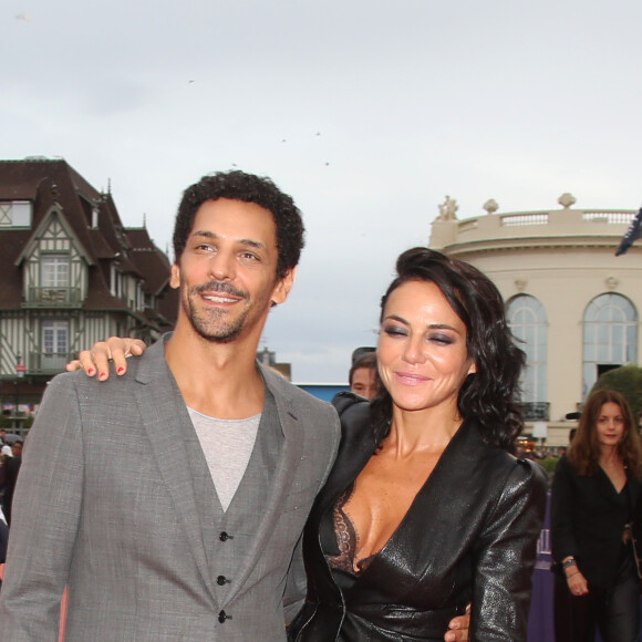 Tomer Sisley et sa compagne Sandra Zeitoun lors de la projection du film 'War dogs'’ lors de la cérémonie de clôture du 42ème Festival du cinéma Américain de Deauville, à Deauville, France, le 10 septembre 2016.