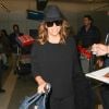 Eva Longoria arrive à l'aéroport de LAX à Los Angeles, le 16 décembre 2016.