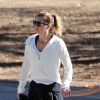 Exclusif - Ellen Pompeo se promène avec son mari Chris Ivery et leur fille Stella. L'epoux de la star porte un mystérieux bébé... A Los Angeles, le mercredi 28 décembre 2016.