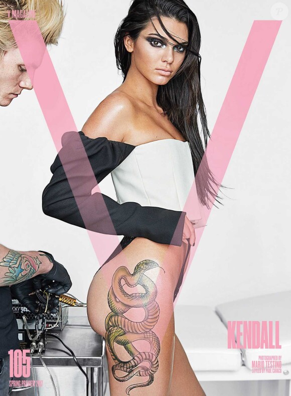 Kendall Jenner en couverture du magazine V avec un faux tatouage sur la cuisse (Un serpent). Le magazine veut mettre en lumière le fait que les mannequins ne peuvent pas faire de modifications sur leur corps, auquel cas ils auraient des problèmes pour leur carrière.