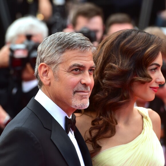 George Clooney et sa femme Amal Alamuddin Clooney (bijoux Cartier) - Montée des marches du film "Money Monster" lors du 69e Festival International du Film de Cannes. Le 12 mai 2016. © Giancarlo Gorassini/Bestimage