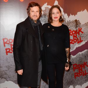 Guillaume Canet et sa compagne Marion Cotillard enceinte - Avant-première du film "Rock'n Roll" au Pathé Beaugrenelle à Paris le 13 février 2017. © Coadic Guirec / Bestimage