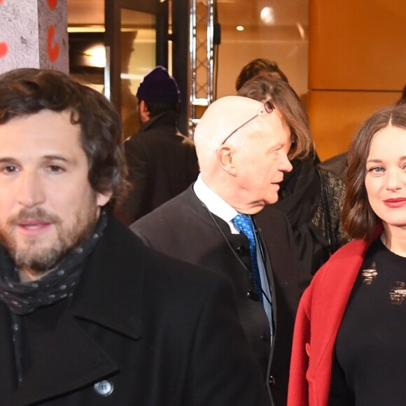 Guillaume Canet et sa compagne Marion Cotillard enceinte arrivent à l'avant-première du film "Rock'n Roll" au Pathé Beaugrenelle à Paris le 13 février 2017.