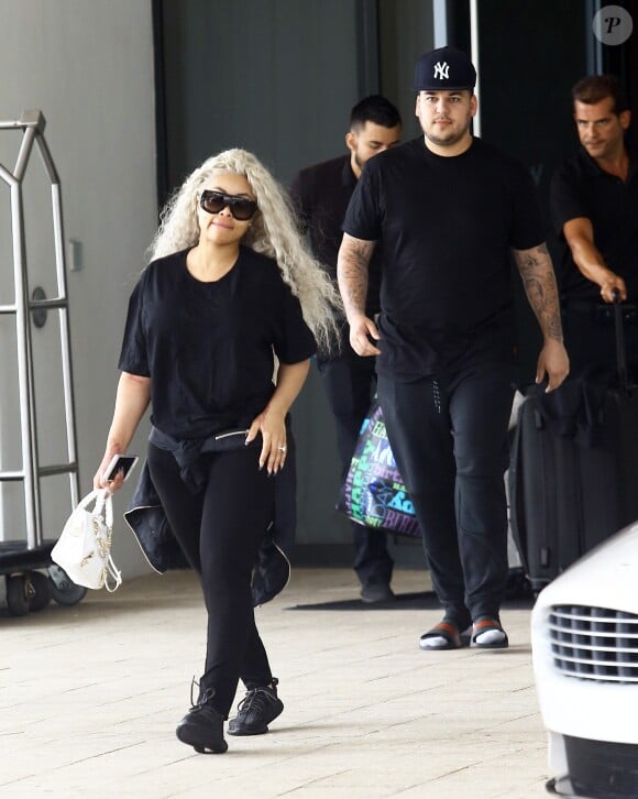 Blac Chyna, enceinte, et son fiancé Rob Kardashian quittent leur hôtel de Miami le 18 mai 2016