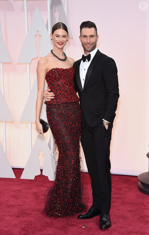 Adam Levine et sa compagne Behati Prinsloo - People à la 87ème cérémonie des Oscars à Hollywood le 22 février 2015.