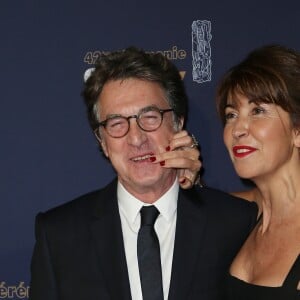 François Cluzet et sa femme Narjiss - Photocall de la 42ème cérémonie des Cesar à la salle Pleyel à Paris, le 24 février 2017. © Dominique Jacovides - Olivier Borde / Bestimage