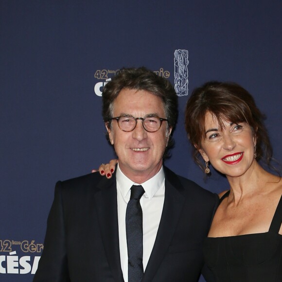 François Cluzet et sa femme Narjiss - Photocall de la 42ème cérémonie des Cesar à la salle Pleyel à Paris, le 24 février 2017. © Dominique Jacovides - Olivier Borde / Bestimage