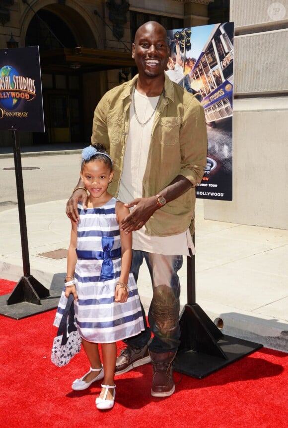 Tyrese Gibson et sa fille Shayla - Inauguration du Fast & Furious Supercharged Ride aux Studios Universal à Los Angeles le 23 juin 2015.