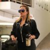 Khloe Kardashian se rend à son cours de gym à Beverly Hills le 12 février 2017  Reality star Khloe Kardashian heads to the gym in Beverly Hills, California on February 12, 2017. Afterwards she ran some errands. Khloe recently celebrated her name change. Her assistants got a specialized cake including her new passport printed onto the icing.12/02/2017 - Beverly Hills